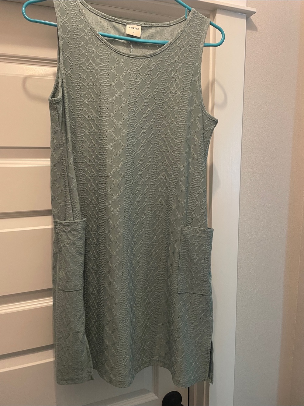 Sleeveless Sage Knit Shift Dress with Side Pockets